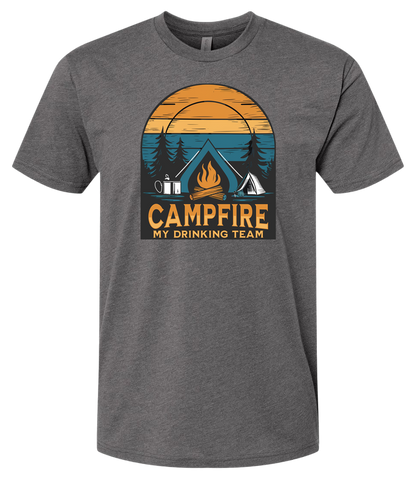 Shirt with a Campfire graphic front and center with bright colors and sunset behind the campfire