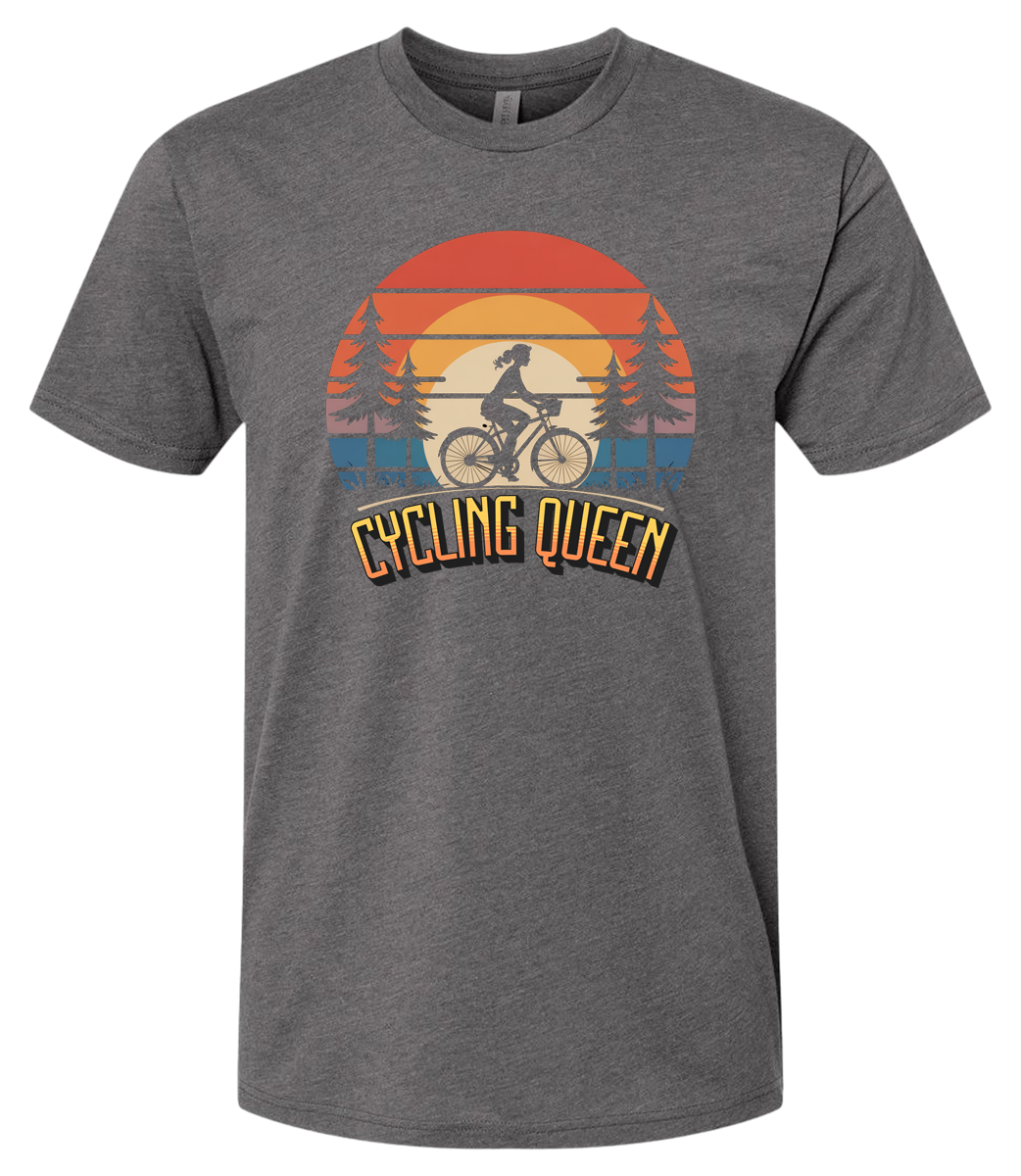 Light blue t-shirt with 'Cycling Queen' graphic design with a retro sunset behind de graphic