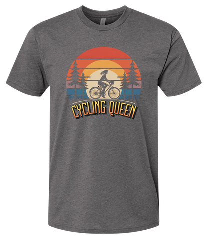 Light blue t-shirt with 'Cycling Queen' graphic design with a retro sunset behind de graphic