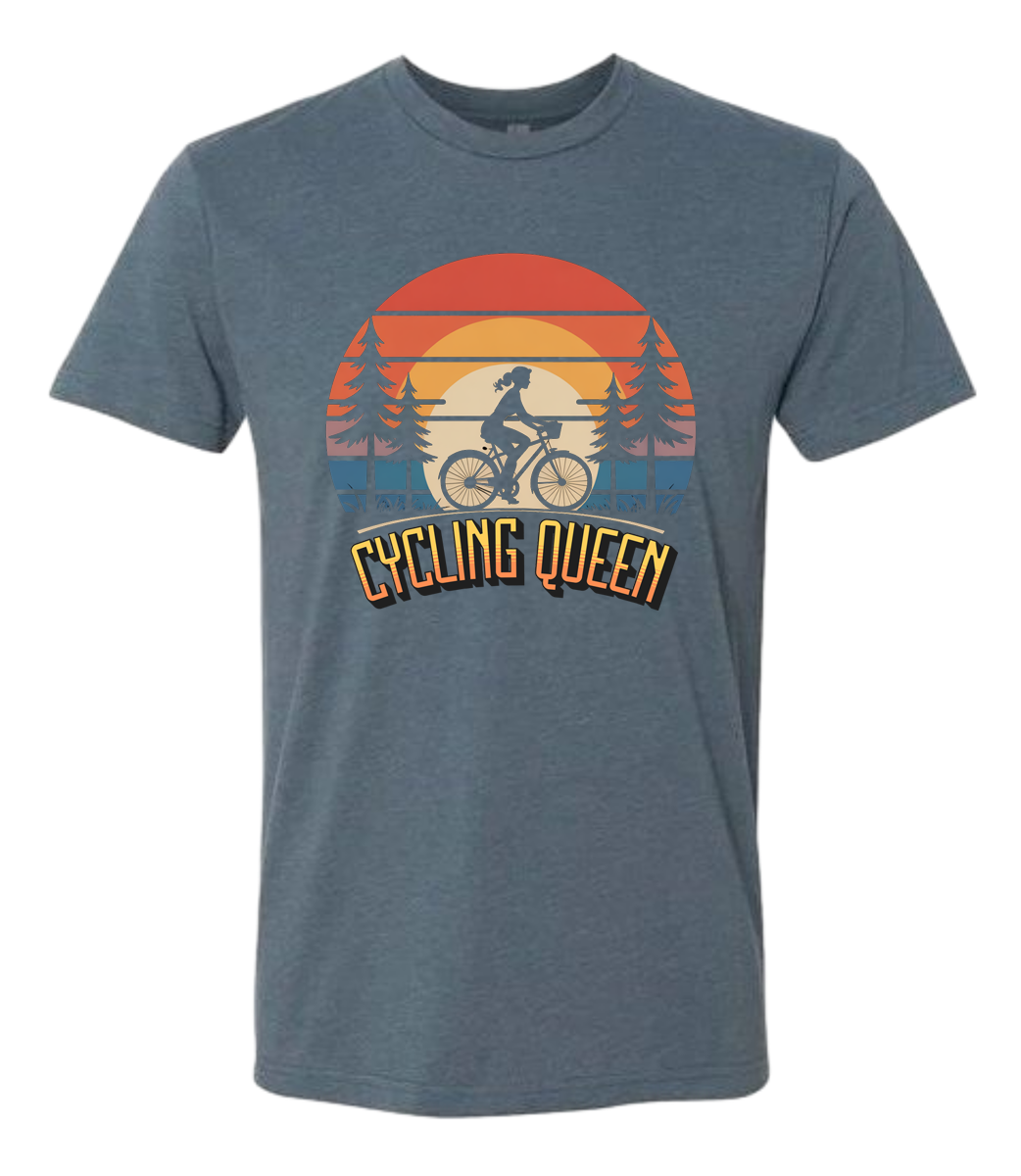 Light blue t-shirt with 'Cycling Queen' graphic design with a retro sunset behind de graphic