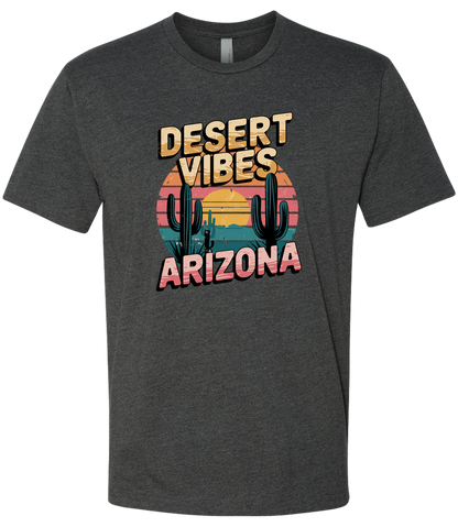 A charcoal-colored crewneck t-shirt with the text 'DESERT VIBES ARIZONA' printed on the front.