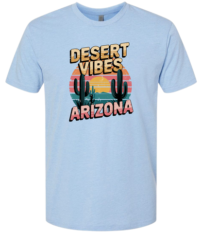 A columbia blue-colored crewneck t-shirt with the text 'DESERT VIBES ARIZONA' printed on the front.