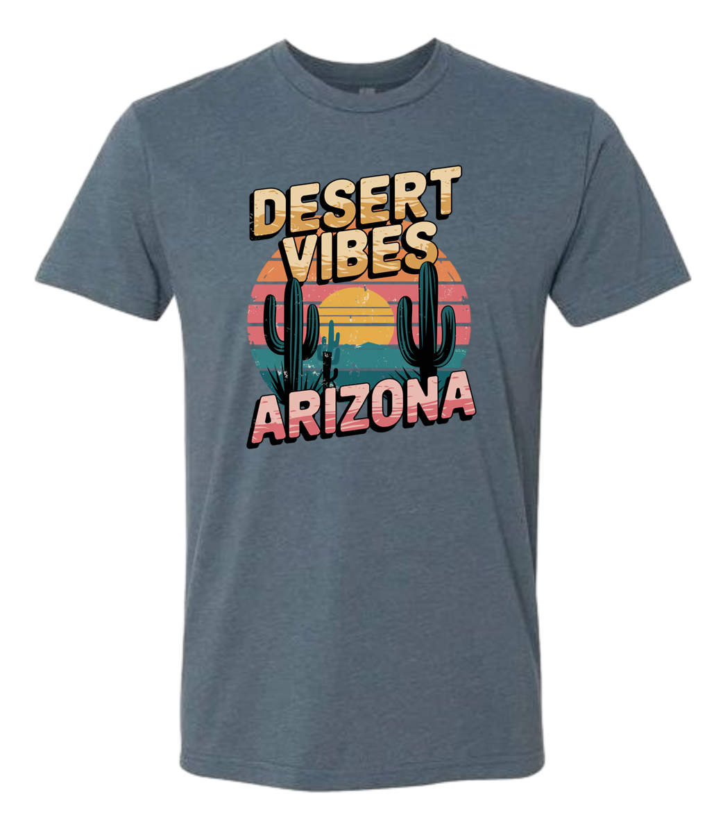 A Indigo-colored crewneck t-shirt with the text 'DESERT VIBES ARIZONA' printed on the front.