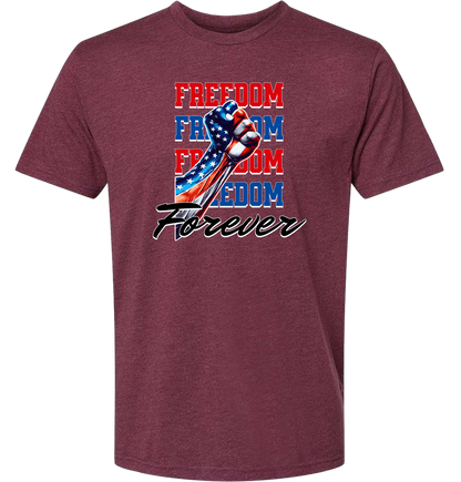 A heather maroon crewneck t-shirt with the text 'FREEDOM' and 'FOREVER' on it, along with an American flag ribbon design.