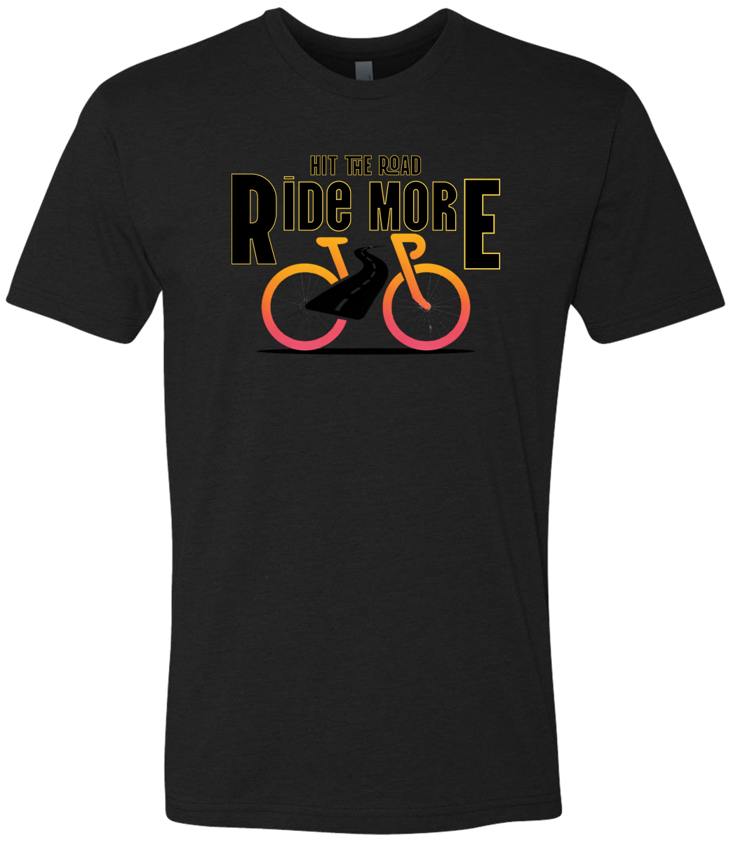 Hit The Road, Ride More letters front and center with a bright bicycle in front of the shirt