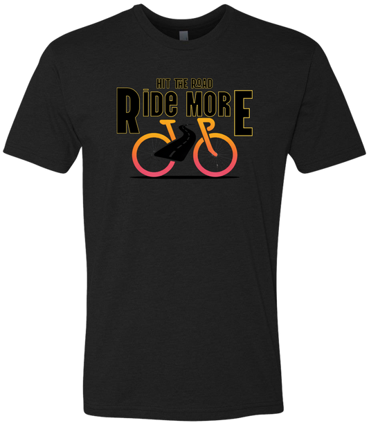 Hit The Road, Ride More letters front and center with a bright bicycle in front of the shirt
