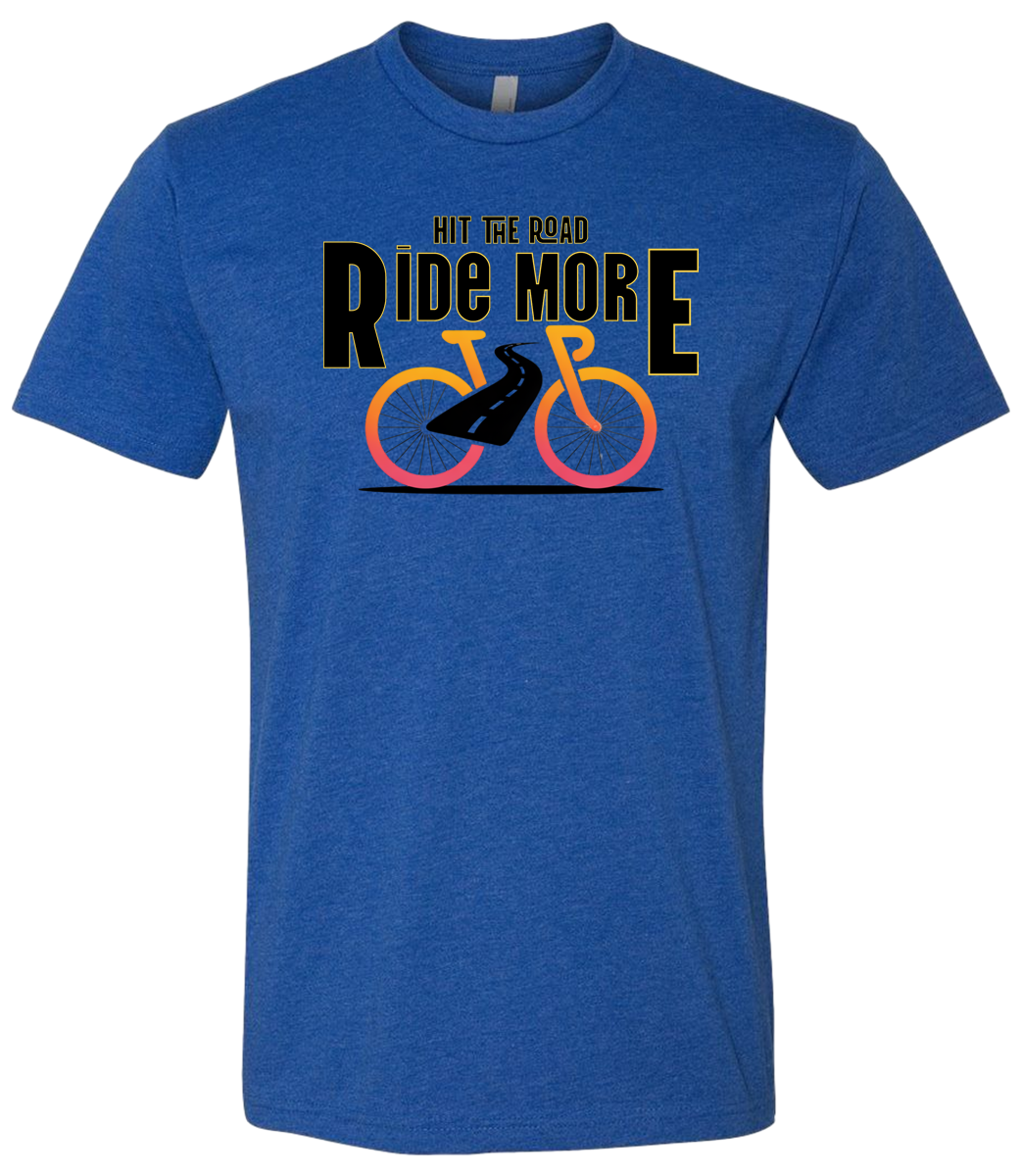 Hit The Road, Ride More letters front and center with a bright bicycle in front of the shirt