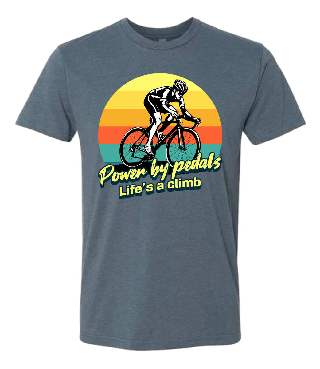 Man riding road bicycle with sunset behind and the words power by pedals, life's a climb front and center