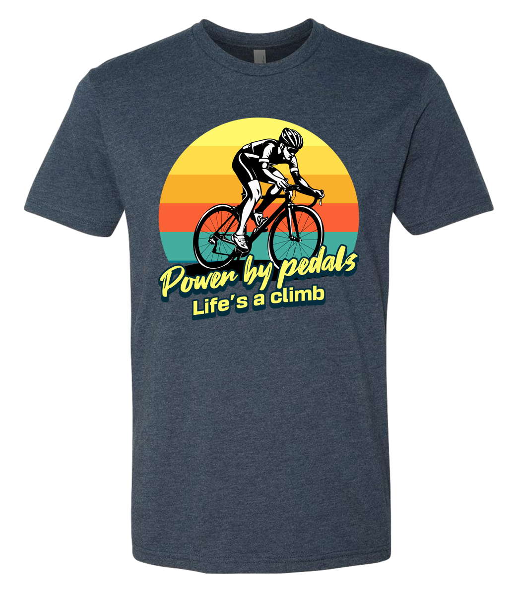 Man riding road bicycle with sunset behind and the words power by pedals, life's a climb front and center