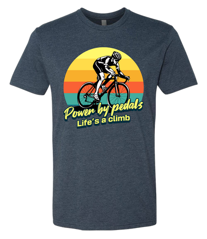 Man riding road bicycle with sunset behind and the words power by pedals, life's a climb front and center