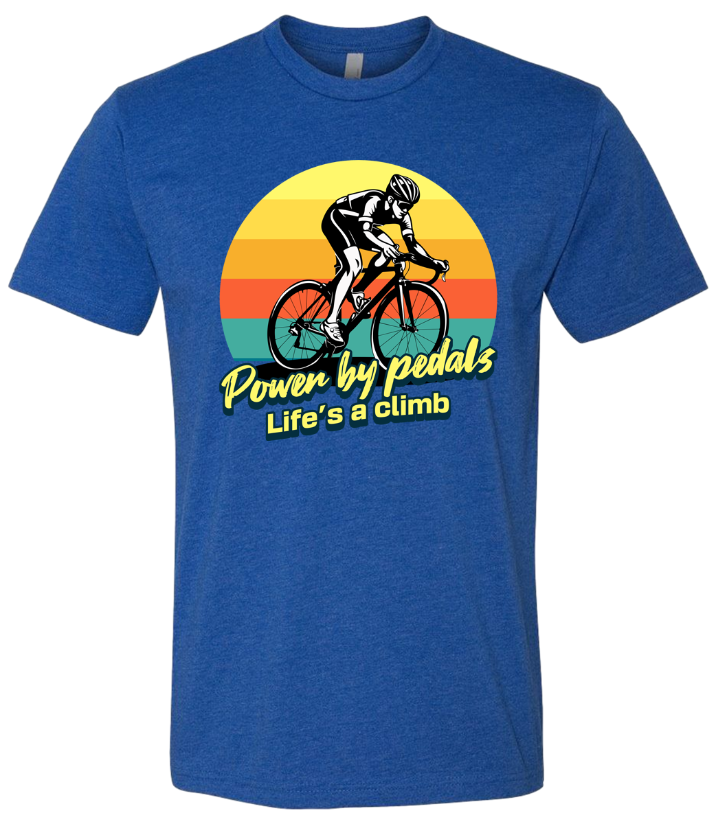 Man riding road bicycle with sunset behind and the words power by pedals, life's a climb front and center