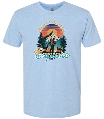 A Columbia Blue crewneck t-shirt with a graphic print of a mountain and the words 'Nature Is Waiting Explore' on it.
