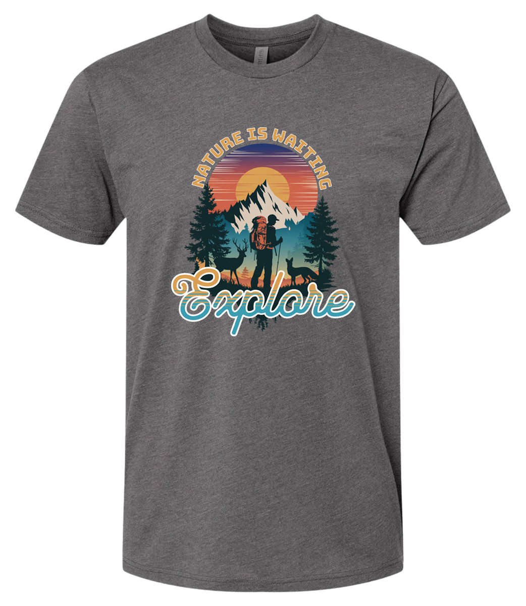 A Heavymetal crewneck t-shirt with a graphic print of a mountain and the words 'Nature Is Waiting Explore' on it.