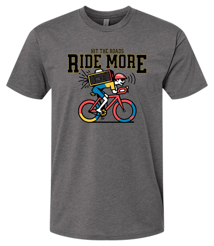 Gray t-shirt with a graphic of a person on a bike and text 'Hit the roads, Ride More' on a white background.