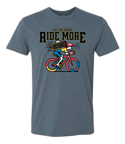 Blue t-shirt with a graphic of a person on a bike and text 'Hit the Roads Ride More' on a white background